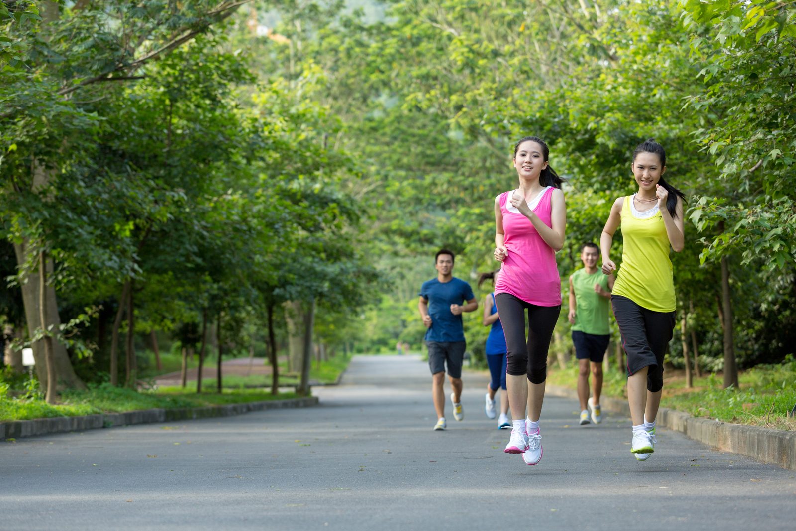 A running club out together in the park